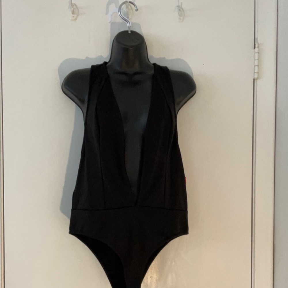 Xtaren What a great bodysuit it’s pant or skirt